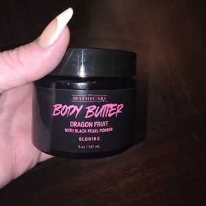 Lush black jar with pink label Body Butter - Dragon Fruit
